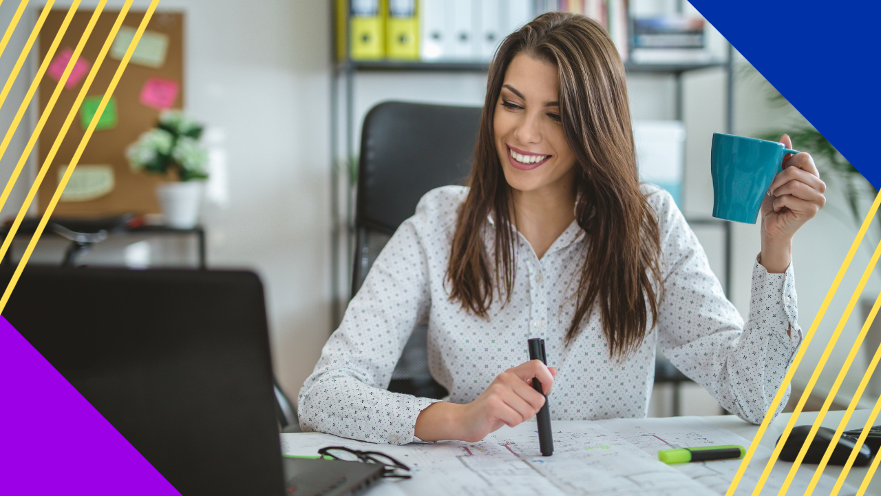 young successful woman managing her emails at her office